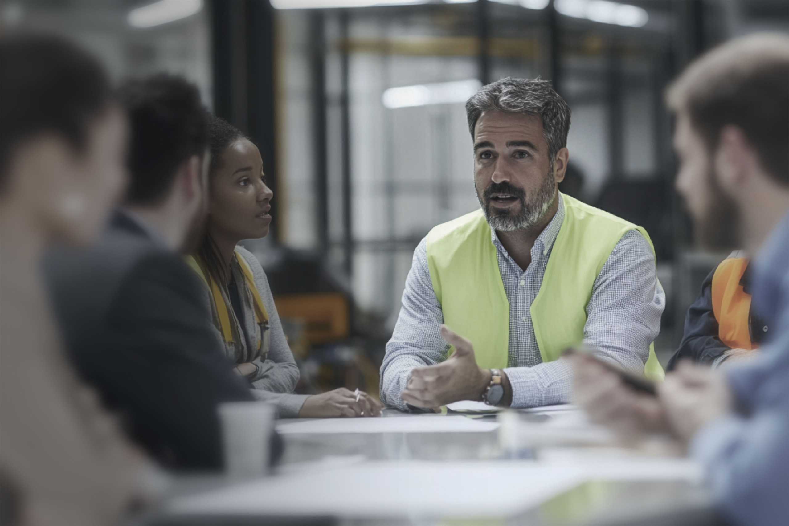Man addressing people in a board room